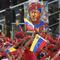 Pendukung membawa gambar mendiang mantan Presiden Hugo Chavez selama parade militer menandai Hari Kemerdekaan di Caracas, Venezuela, Senin (5/7/2021). Venezuela menandai 210 tahun deklarasi kemerdekaan mereka dari Spanyol. (AP Photo/Matias Delacroix)