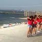 JKT48 tampil di Asian Games 2018, tepatnya di arena jetski, di Ancol, Minggu (26/8/2018). (Bola.com/Benediktus Gerendo Pradigdo)