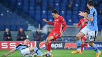 Jamal Musiala, pemain muda yang bersinar ketika Bayern Munchen mengalahkan Lazio pada leg 1 babak 16 besar Liga Champions 2020/2021, Rabu (24/02/2021) dini hari WIB. (Alberto PIZZOLI / AFP)