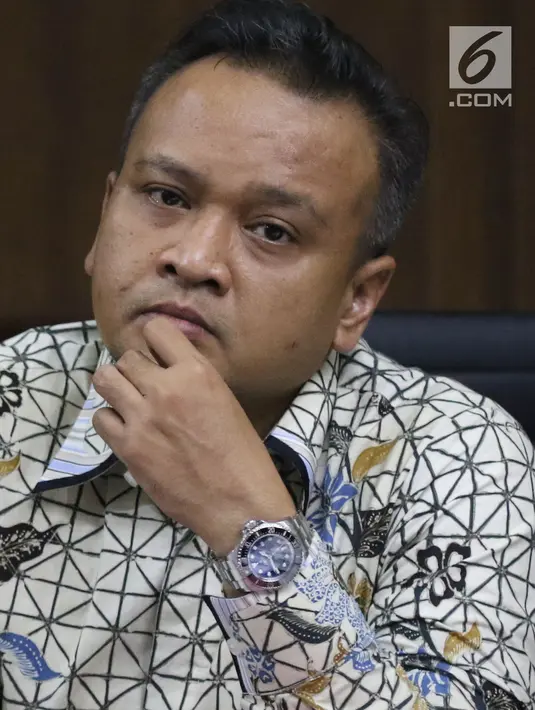 Terdakwa dugaan korupsi pengadaan e-KTP, Irvanto Hendra Pambudi saat menjalani sidang lanjutan di Pengadilan Tipikor, Jakarta, Selasa (18/9). Sidang mendengar keterangan enam saksi, salah satunya Setya Novanto. (Liputan6.com/Helmi Fithriansyah)