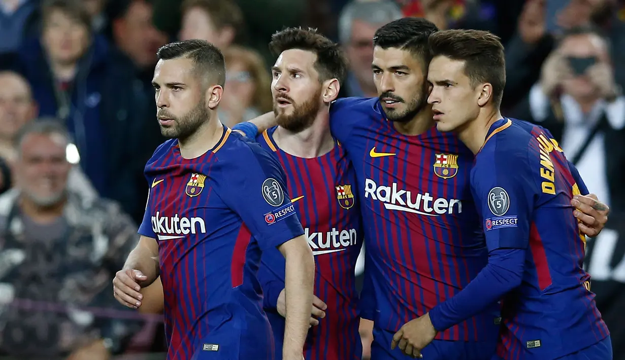 Pemain Barcelona merayakan golnya saat melawan AS Roma pada pertandingan Liga Champions di stadion Camp Nou di Barcelona (4/3). Barcelona menang 4-1 ketika menjamu AS Roma. (AP Photo / Manu Fernandez)