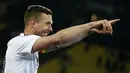Lukas Podolski  menempati peringkat ketiga top scorer timnas Jerman dengan koleksi gol sebanyak 49 kali. Tercatat Podolski mencetak gol pertamanya pada 21 Desember 2004. (EPA/Ronald Wittek)