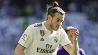 Gareth Bale mencetak satu gol untuk membantu Real Madrid mengalahkan Celta Vigo 2-0 dalam lanjutan Liga Spanyol di Santiago Bernabeu, Sabtu (16/3/2019). (AP Photo/Paul White)