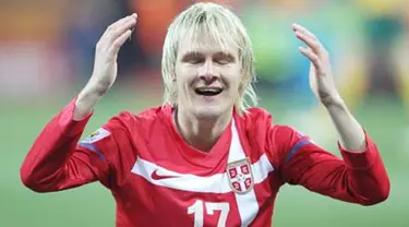 Ekspesi gelandang Serbia Milos Krasic di laga penyisihan Grup D PD 2010 lawan Austria di Mbombela Stadium, Nelspruit, 23 Juni 2010. Serbia kalah 1-2. AFP PHOTO / VALERY HACHE 