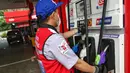 Pertamax Green merupakan bahan bakar Pertamax dengan campuran 5 persen etanol yang terbuat dari bahan nabati molases tebu. (Liputan6.com/Angga Yuniar)