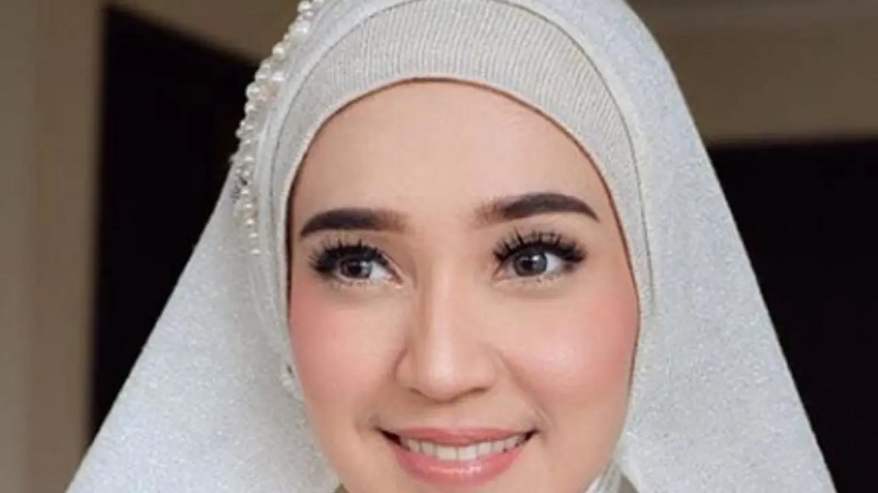 Dhini Aminarti