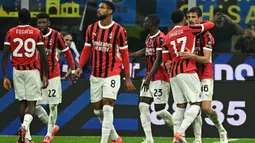AC Milan sukses membungkam Inter Milan dengan skor 2-1 dalam laga bertajuk Derby della Madonnina. (Gabriel BOUYS/AFP)