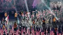 Kontingen Indonesia tampil berbusana jas pada parade atlet pembukaan SEA Games 2017 di Stadion Bukit Jalil, Kuala Lumpur, Malaysia, Sabtu (19/8). (Liputan6.com/Faizal Fanani)