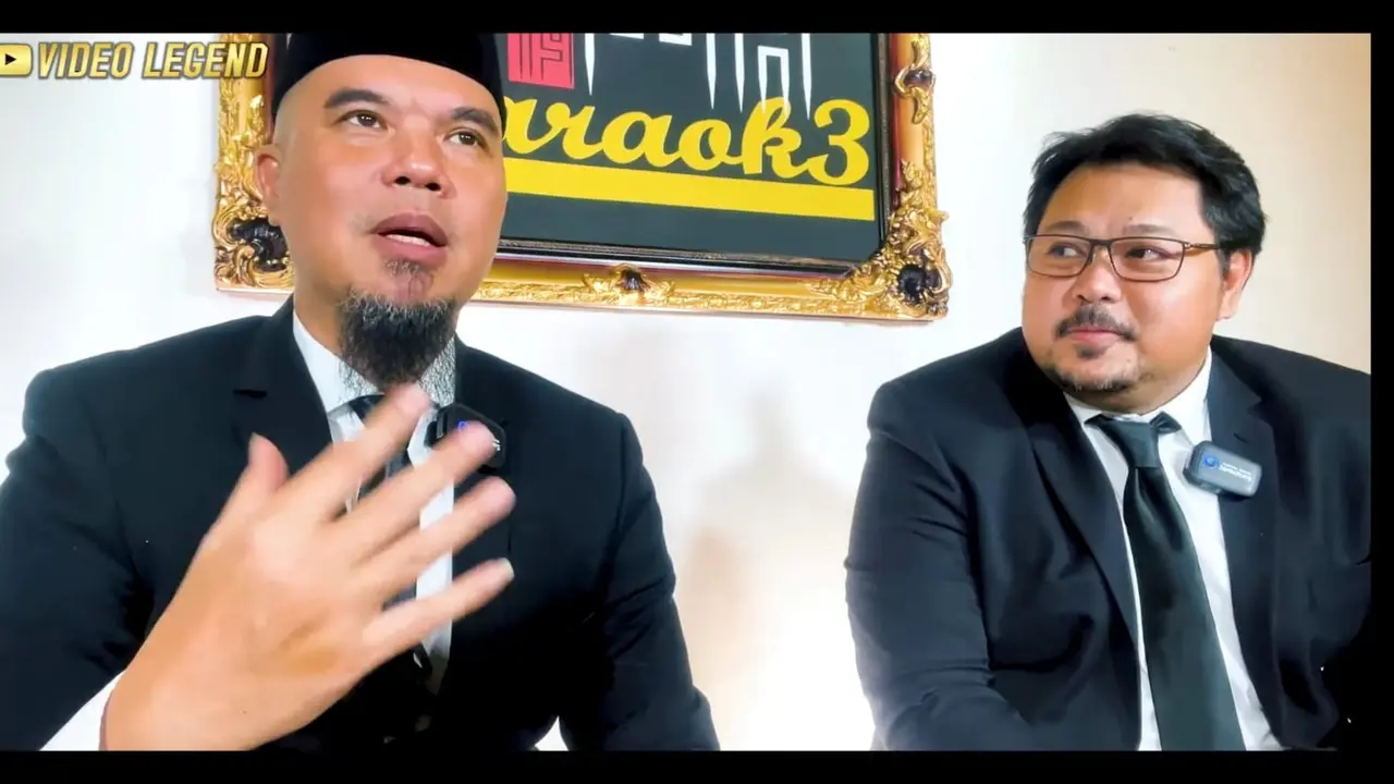 Ahmad Dhani bersama rekannya yang bernama Indra Muhammad Putra