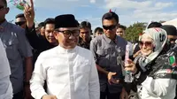 Calon wakil presiden nomor urut 3 Muhaimin Iskandar atau Cak Imin saat kampanye di Lapangan Taman Kirana, Solear, Kabupaten Tangerang, Jumat (2/2/2024). (Pramita Tristiawati/Liputan6.com).