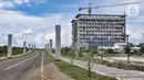 Aktivitas di proyek pembangunan gedung Universitas Islam Internasional Indonesia (UIII) di Cimanggis, Depok, Minggu (28/2/2021). Kampus UIII diharapkan menjadi kebanggan Indonesia dan kampus masa depan bagi kajian serta penelitian peradaban Islam. (merdeka.com/Iqbal S Nugroho)