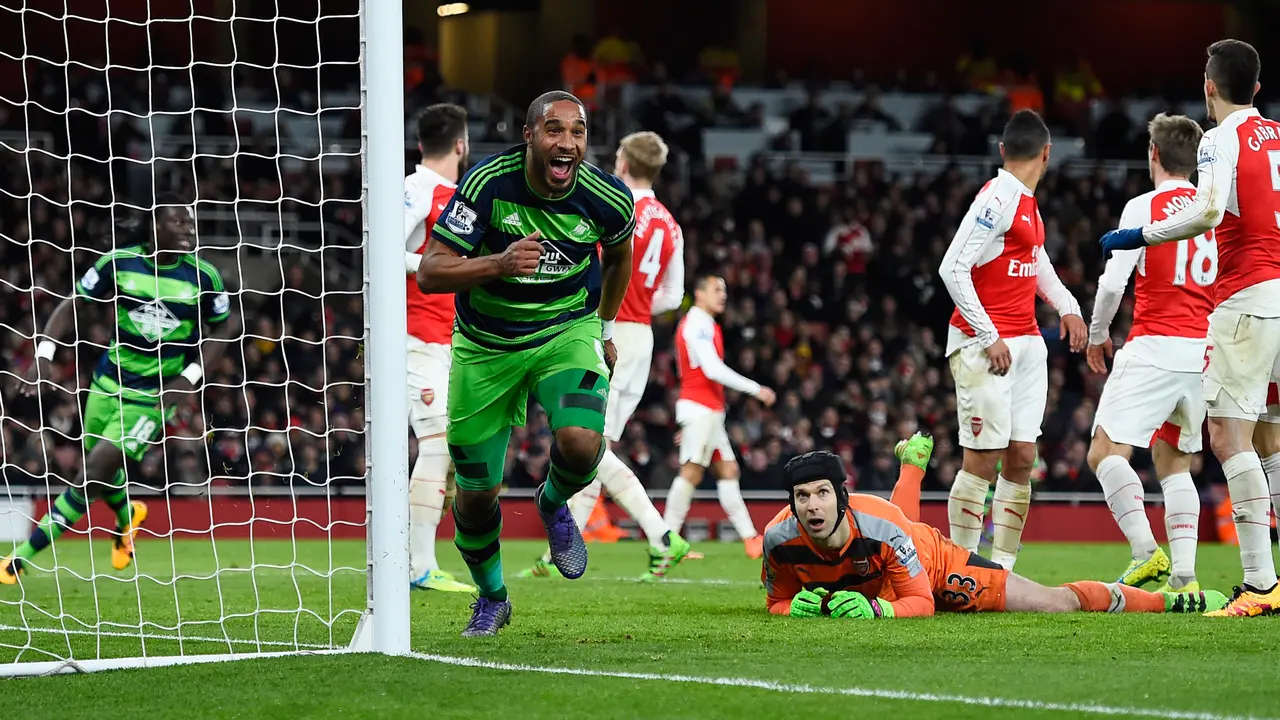 20160303-Liga-Inggris-Swansea-Arsenal-Reuters