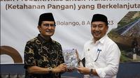 Wakil Ketua MPR RI Fadel Muhammad bersama Bupati Bone Bolango Hamim Pou (Arfandi Ibrahim/Liputan6.com)