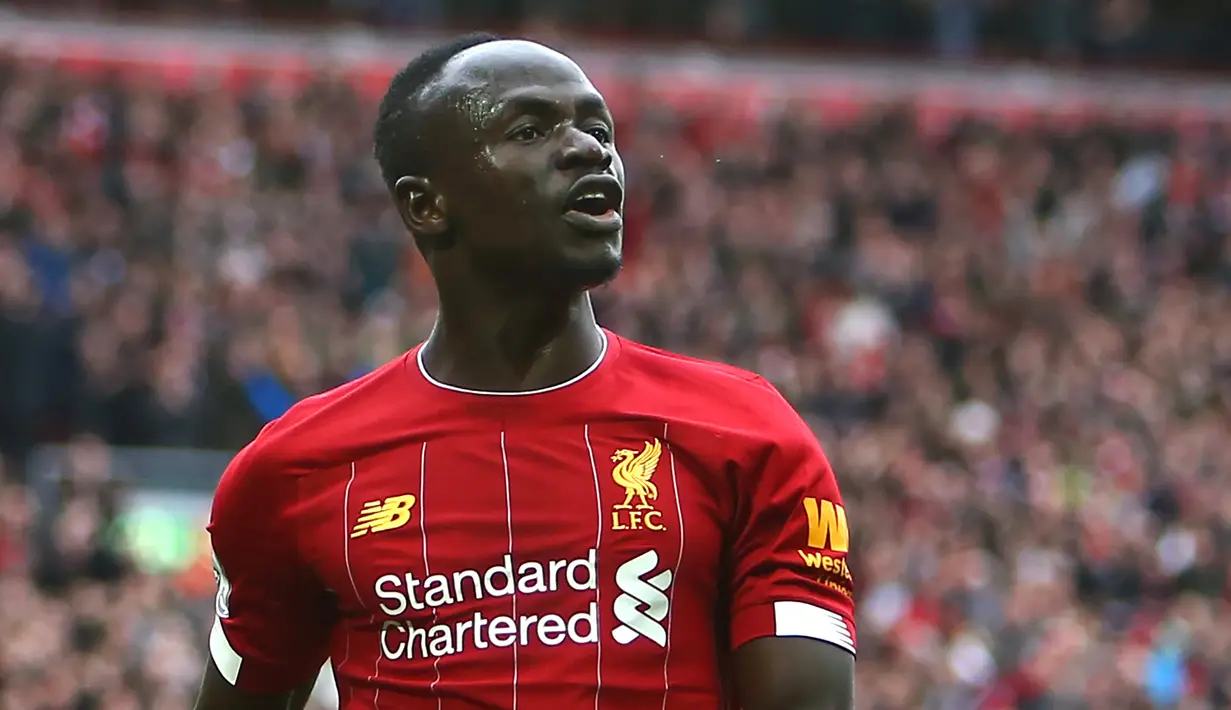 Kemampuan Mane dalam di lini sayap Liverpool terbilang sangat apik. Pemain asal Senegal ini mempunyai fisik yang kuat, hebat di udara, handal menekan barisan lawan dan mampu mencetak gol dari kedua kakinya. (AFP/Geoff Caddick)
