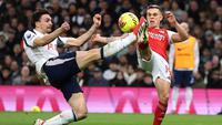 Laga yang bertajuk Derby London utara tersebut berlangsung sengit sejak awal pertandingan. Dua gol mewarnai laga sebelum turun minum. (AP Photo/Ian Walton)