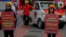 Massa buruh yang tergabung dalam Gerakan Buruh Bersama Rakyat (GEBRAK) menggelar demo di kawasan di Patung Kuda, Jakarta Pusat, Kamis (20/10/2022). Mereka menuntut harga bahan bakar minyak (BBM) diturunkan hingga mendesak pemerintah mencabut UU Cipta Kerja (Ciptaker). (Liputan6.com/Faizal Fanani)