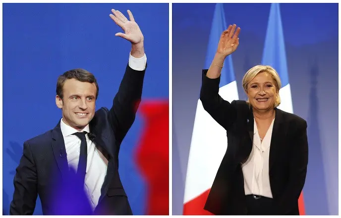 Dua kandidat kuat Pilpres Prancis 2017, Emmanuel Macron dan Marine Le Pen (Christophe Ena & Bob Edne/AP)