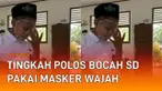 Tingkah polos bocah tidak bisa ditebak, seperti siswa SD laki-laki berikut ini. Saat dipanggil ke depan kelas, tampak bocah tersebut menutupi wajahnya. Hingga kemudian bocah itu menampilkan wajahnya yang memakai masker.