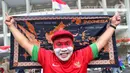 Pendukung timnas Indonesia saat berada di area Stadion Utama Gelora Bung Karno (SUGBK), Jakarta, Selasa (10/9/2024). (Liputan6.com/Angga Yuniar)