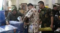Diminta siapkan kain kafan, Wali Kota Risma siap kirim untuk korban gempa Lombok. (Liputan6.com/Dian Kurniawan)