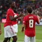 Paul Pogba merayakan gol Juan Mata ke gawang Kristiansund pada laga uji coba di Ullevaal Stadium, Selasa (30/7/2019) dini hari WIB. (Twitter ManUtd)