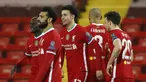 Gelandang Liverpool, Curtis Jones (tengah), merayakan gol bersama rekan-rekannya dalam laga lanjutan Liga Champions 2020/21 Grup D melawan Ajax Amsterdam di Anfield Stadium, Liverpool, Selasa (1/12/2020) waktu setempat. Liverpool menang 1-0 atas Ajax. (AFP/Phil Noble/Pool)
