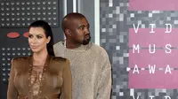 Kim Kardashian dan Kanye West (Bintang/EPA)