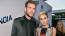Meski sempat dikabarkan batal tunangan, kedua pasangan ini akhirnya rujuk kembali. Liam Hemsworth berhasil klarifikasi ke publik tentang hubungannya dengan Miley. (AFP/Bintang.com)