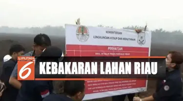 Sebuah patok dipasang di sebuah lahan seluas lebih dari empat hektar yang dikelola oleh perusahaan berinisial AD.