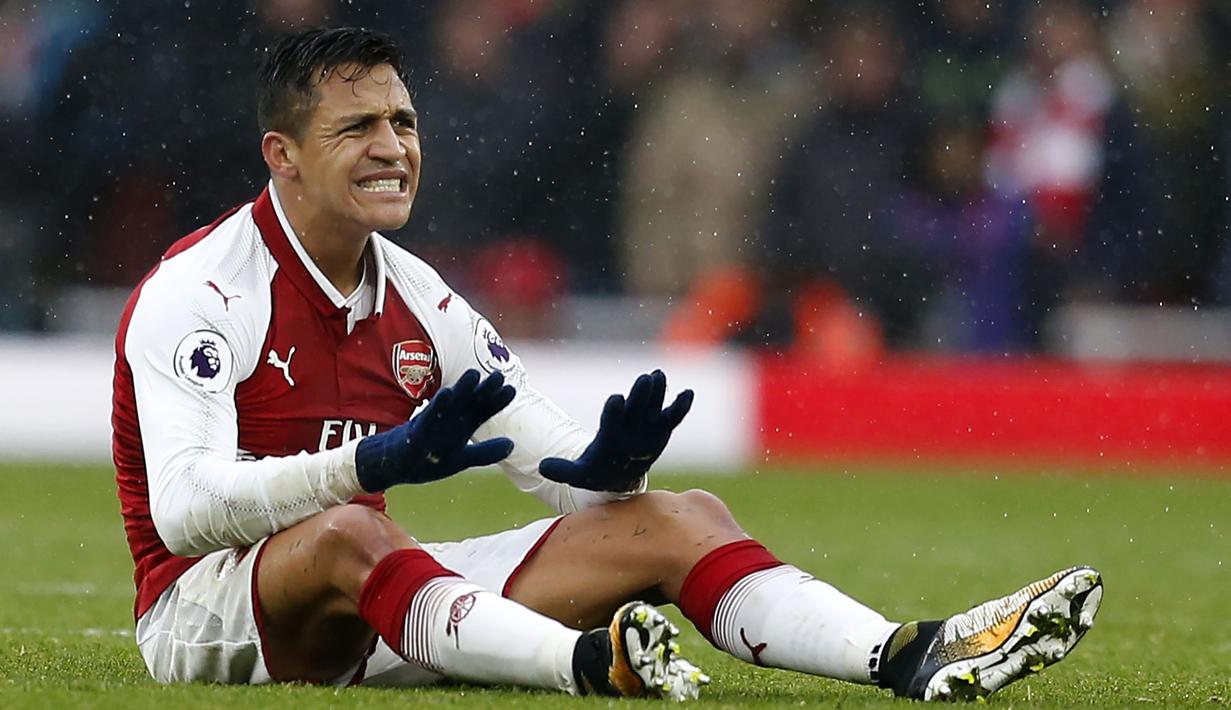 Kabarnya Real Madrid bersaing Manchester City untuk mendapatkan tandan tangan pemain Arsenal, Alexis Sanchez pada bursa transfer januari 2018. (AFP/IKIMAGES/Ian Kington)