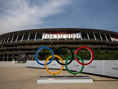 Stadion Nasional Jepang merupakan salah satu venue yang terletak di Kasumigaoka, Shinjuku, Tokyo, Jepang. Venue ini akan digunakan untuk cabang olah raga sepak bola, atletik, dan menjadi tempat pembukaan dan penutupan Olimpiade Tokyo 2020. (Foto: AFP/Behrouz Mehri)