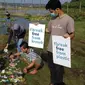 Komunitas Environmental Green Society menggelar audit sampah plastik di Waduk Karangkates. Pencemaran sampah yang sulit terurai di waduk ini sangat memprihatinkan (Envigreen Society)