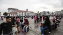 Wisatawan menikmati suasana Kawasan Kota Tua, Jakarta, Selasa (26/12). Musim libur akhir tahun sepanjang Natal dan Tahun Baru dimanfaatkan warga Jakarta untuk menyerbu berbagai tempat wisata, salah satunya kawasan Kota Tua. (Liputan6.com/Faizal Fanani)