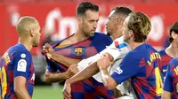 Gelandang Barcelona, Sergio Busquest, menyebut dua hasil imbang yang diraih secara beruntun di La Liga 2019-2020 memberi keuntungan buat Real Madrid. (AFP/Cristina Quicler)