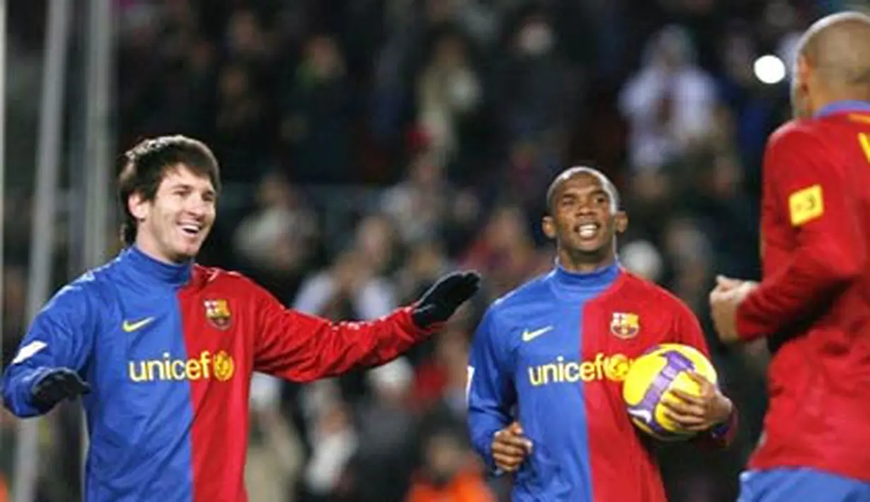 Barcelona's Thierry Henry is congratulated by his teamate Lionel Messi and Samuel Eto'o during Liga match Barcelona vs Numancia at New Camp Stadium in Barcelona, on January 24, 2009. AFP PHOTO/JOSEP LAGO 