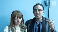 Sandy Tumiwa dan Shinta Bebi (Herman Zakharia/Liputan6.com)