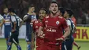 Striker Persija Jakarta, Marko Simic, merayakan gol yang dicetaknya ke gawang Arema FC pada laga Liga 1 di SUGBK, Jakarta, Sabtu (31/3/2018). Persija menang 3-1 atas Arema FC. (Bola.com/Vitalis Yogi Trisna)