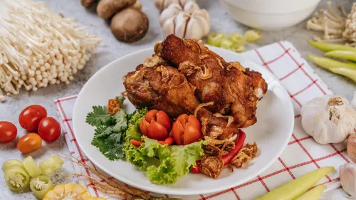 074305400_1700033897-fried-chicken-leg-with-tomato-chili-fried-onion-lettuce-corn-needle-mushroom__1_