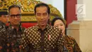 Presiden Joko Widodo tiba untuk memberikan arahan kepada dalam rangka Jambore Sumber Daya Program Keluarga Harapan (PKH) di Istana Negara, Jakarta, Kamis (13/12). Jambore diikuti 598 peserta dari seluruh Indonesia. (Liputan6.com/Angga Yuniar)
