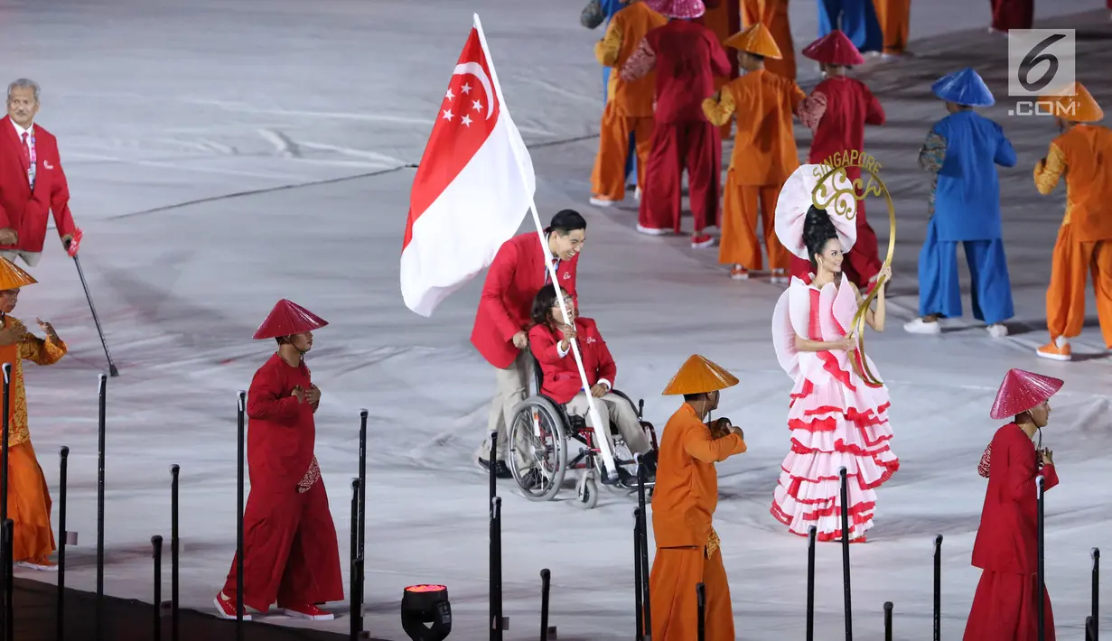 Atlet Para Games dari berbagai negara melakukan defile saat pembukaan Asian Para Games 2018 di Stadion Utama Gelora Bung Karno, Jakarta, Sabtu (6/10). Asian Para Games 2018 berlangsung 6-13 Oktober. (Liputan6.com/Helmi Fithriansyah)