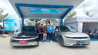 Pengisian mobil listrik di SPKLU Rest Area KM 311 A Tol Kayu Agung-Bakaheuni, tepatnya Kecamatan Sematang Panggang Kota Kayu Agung Kabupaten Ogan Komering Ilir (OKI) Sumsel (Liputan6.com / Nefri Inge)