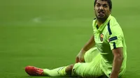 Luis Suarez saat mengalami cedera lawan Muenchen (AFP)