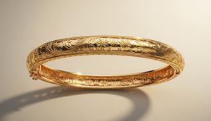 Gelang Emas yang Elegan untuk Ibu 40 Tahunan Saat Lebaran 2026 (Sumber: gemini.com)