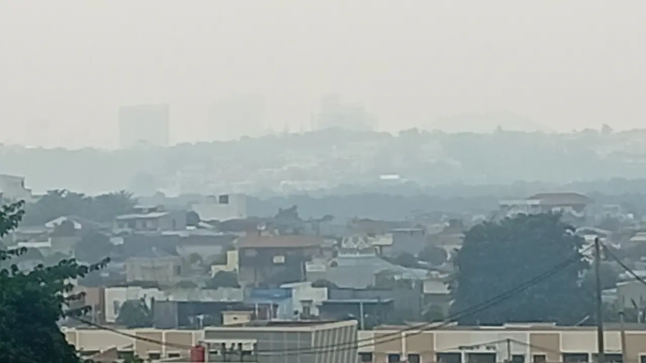 Ilustrasi dampak asap kabut akibat kebakaran hutan dan lahan Sumatera.