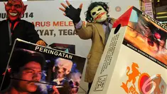 Aksi teatrikal advokasi publik bertajuk "Indonesia Harus Melek Bahaya Merokok", Jakarta, Selasa (24/06/2014) (Liputan6.com/Andrian M Tunay) 