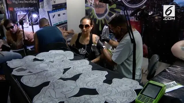 Pagelaran Tatto Week ketujuh digelar di Rio De Janeiro. Seniman tato dari seluruh dunia berkumpul dan melakukan aksi social untuk para penyintas kanker.