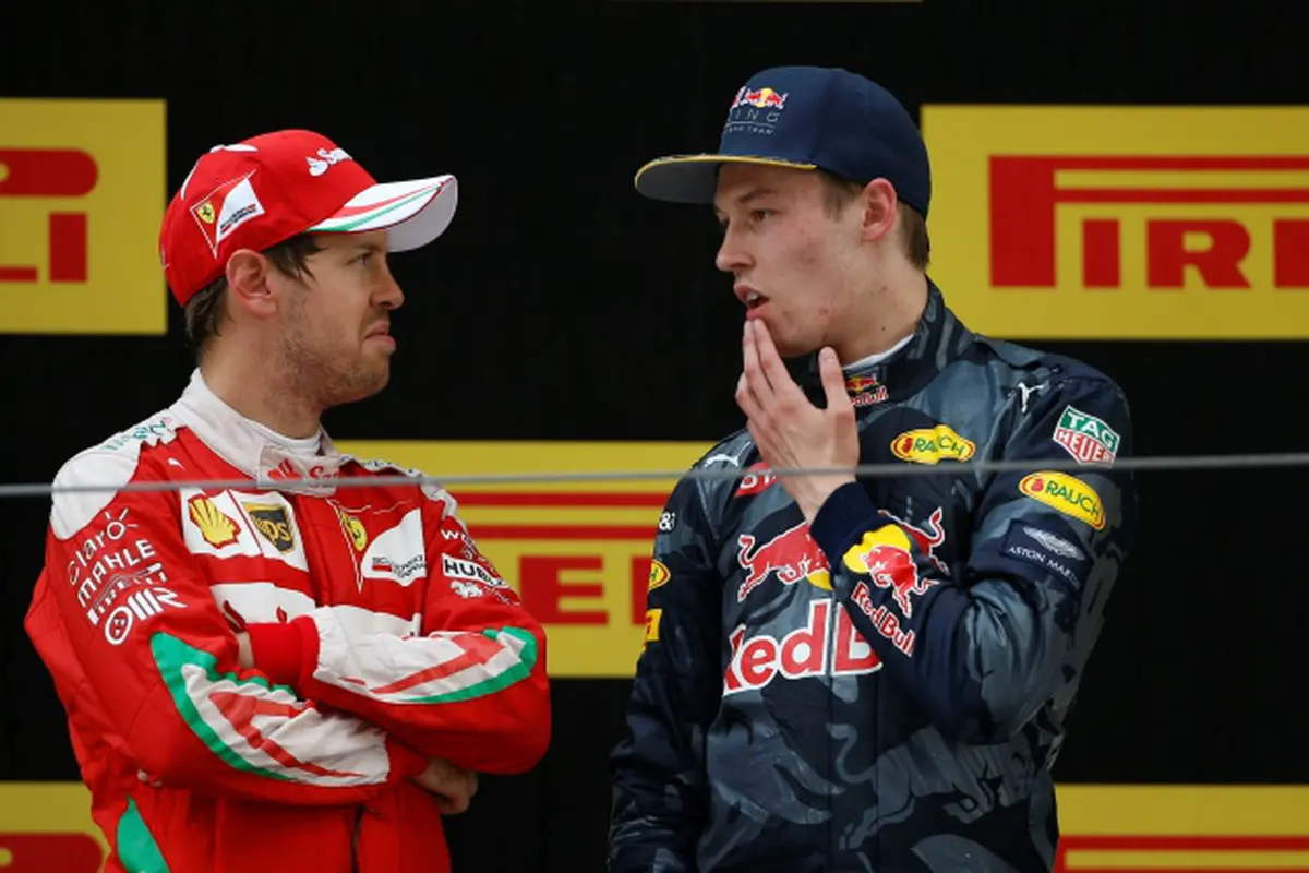 Daniil Kvyat dan Sebastian Vettel