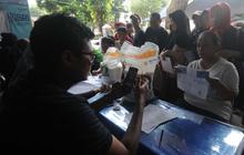 FOTO: Bulog Salurkan Bantuan Pangan Beras 10 Kg untuk 269.000 Keluarga di Jakarta