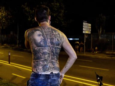 Berpisahnya Barcelona dan Lionel Messi menjadi kabar yang mengejutkan di jagat sepak bola dunia. Fans Barca tentunya menjadi pihak yang sangat terpukul dengan kenyataan ini. (Foto: AFP/Pau Barrena)