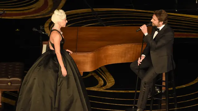 Penampilan Lady Gaga dan Bradley Cooper di Oscar 2019  (Photo by Chris Pizzello/Invision/AP)